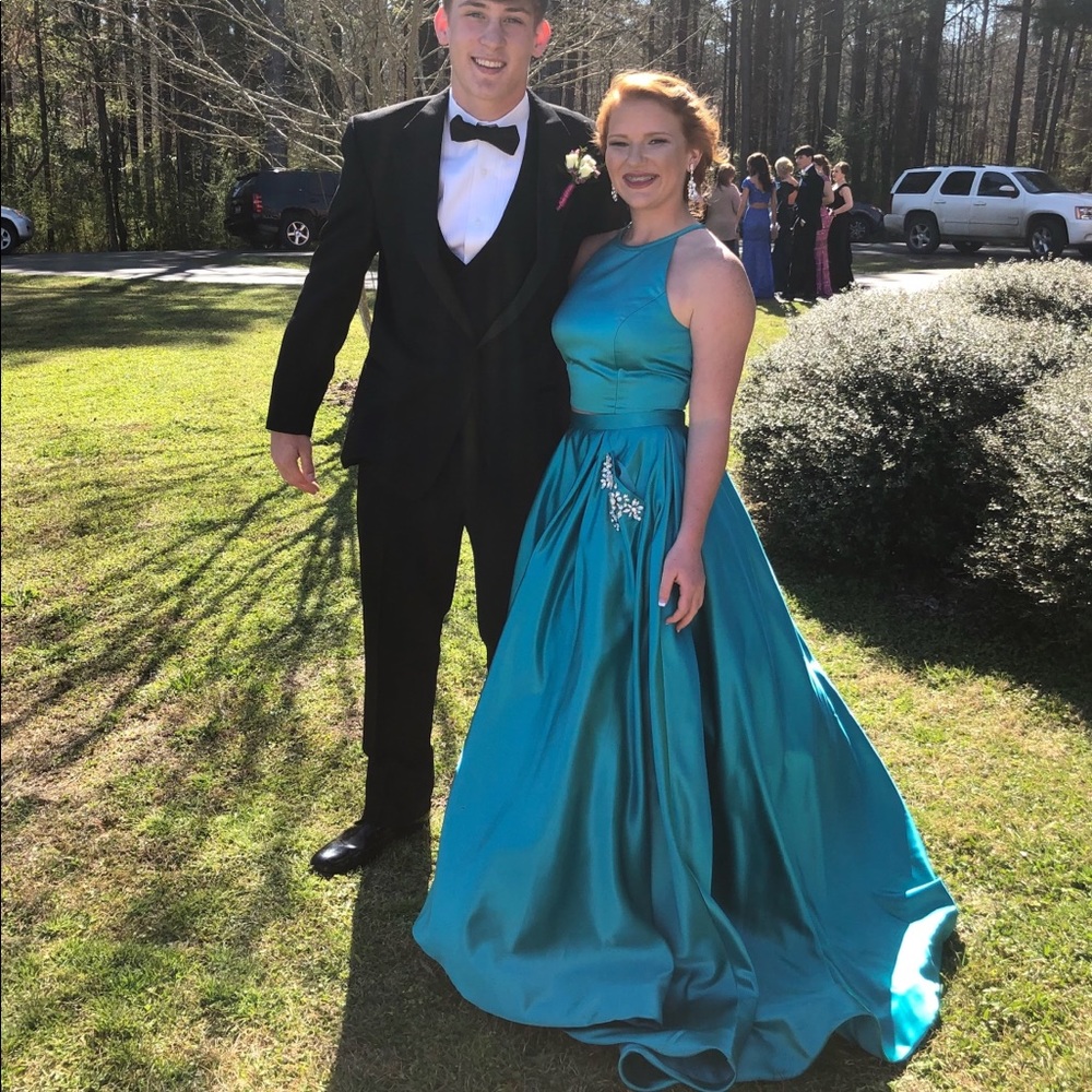 SHERRI HILL size 2 but let out to fit close to a 4